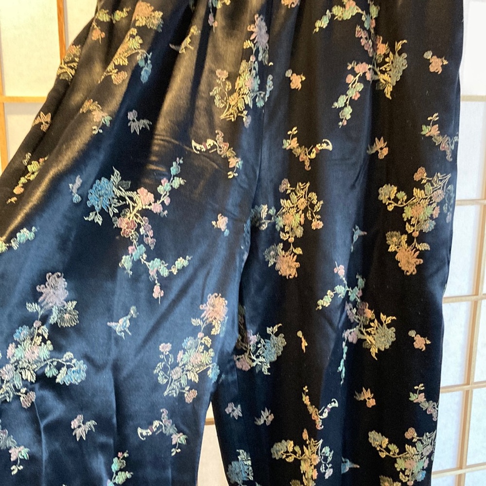 Beautiful black flowered “silk” pants.